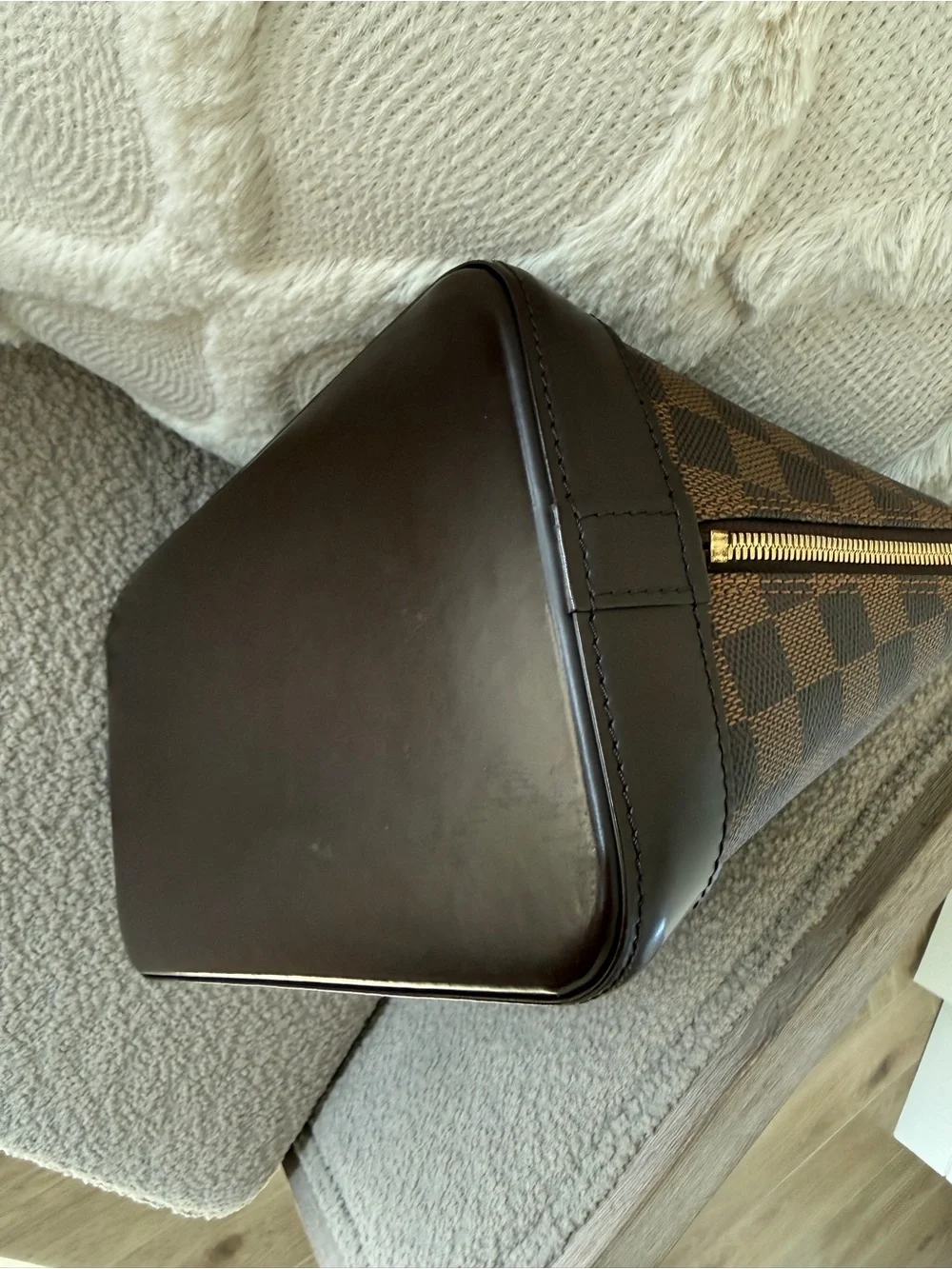 Louis Vuitton imperfections lock